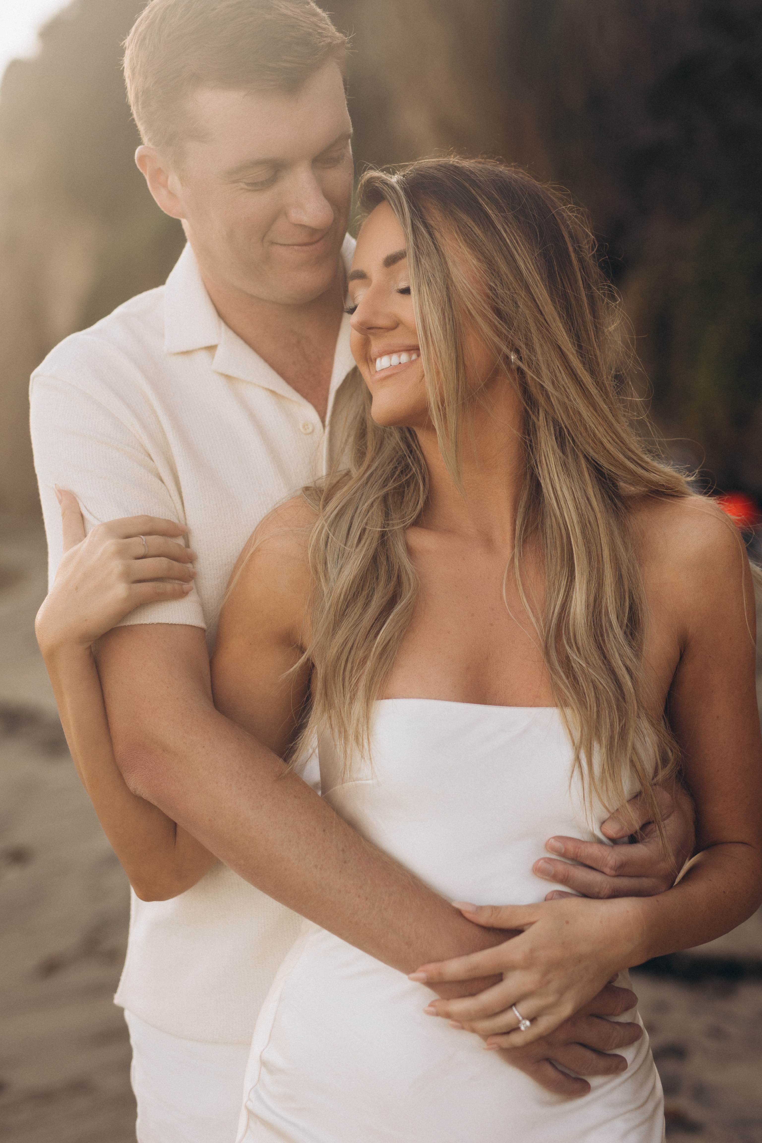 Couple on the beach at sunset