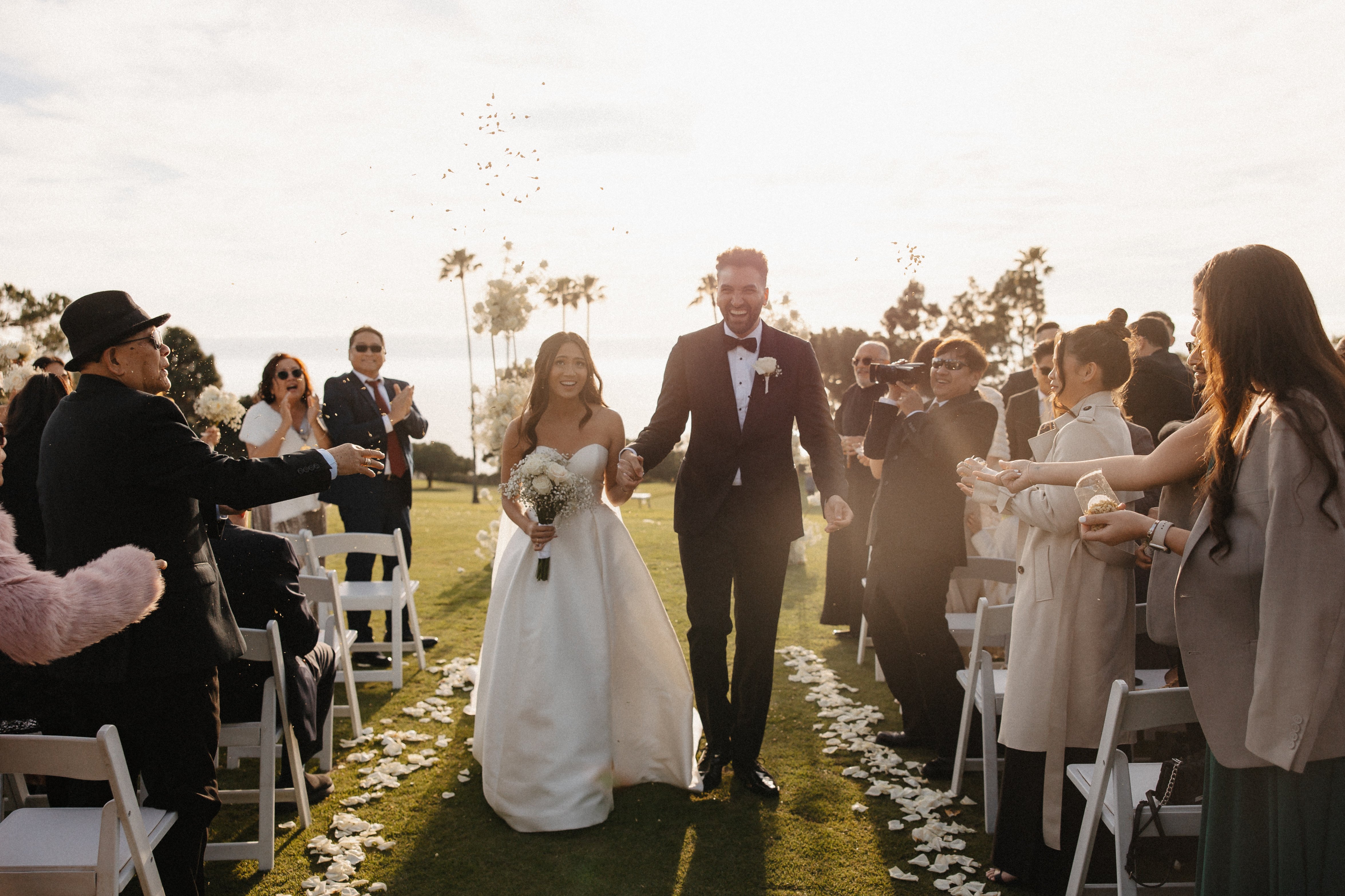 Joyful ceremony exit with confetti