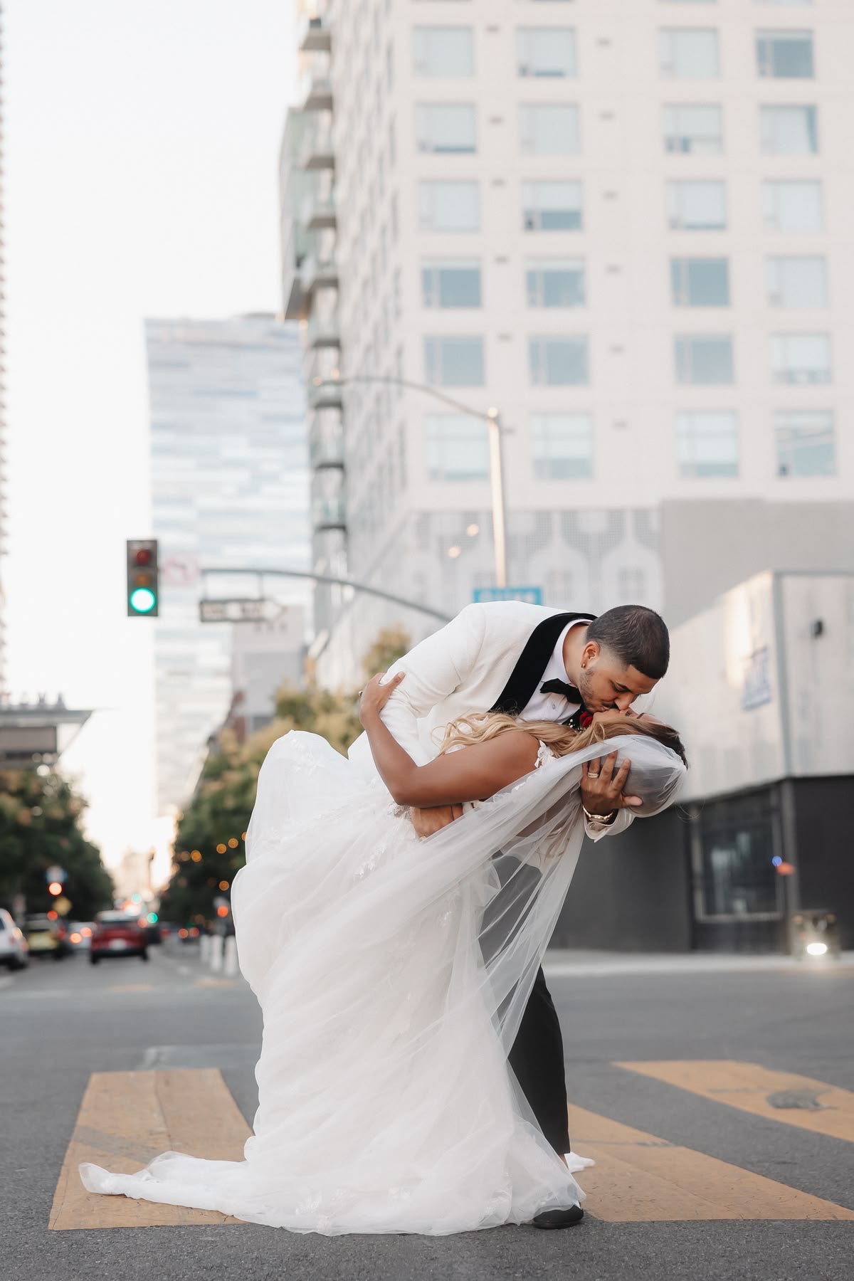 Dramatic dip kiss in downtown city street